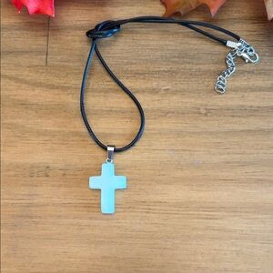 Very pale blue resin cross with black cord cross Pendant Necklace